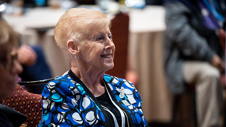 woman-at-a-conference-smiling