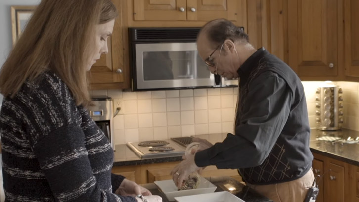 patient-and-caregiver-cooking-in-kitchen