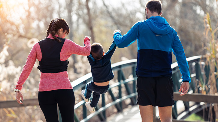 family-walking-in-park