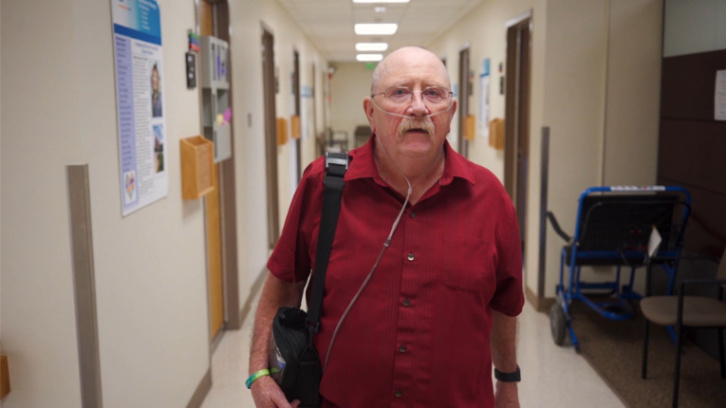 Pulmonary-fibrosis-patient-leaving-doctors-office