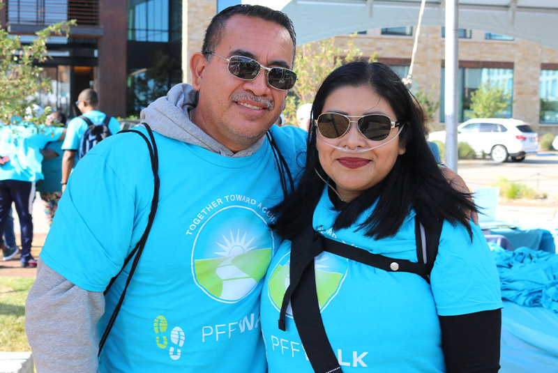 woman-with-oxygen-and-man-caregiver
