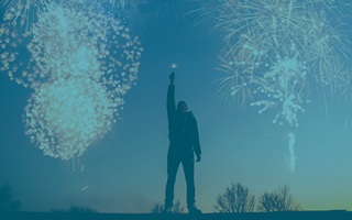 person-with-fireworks-behind-them